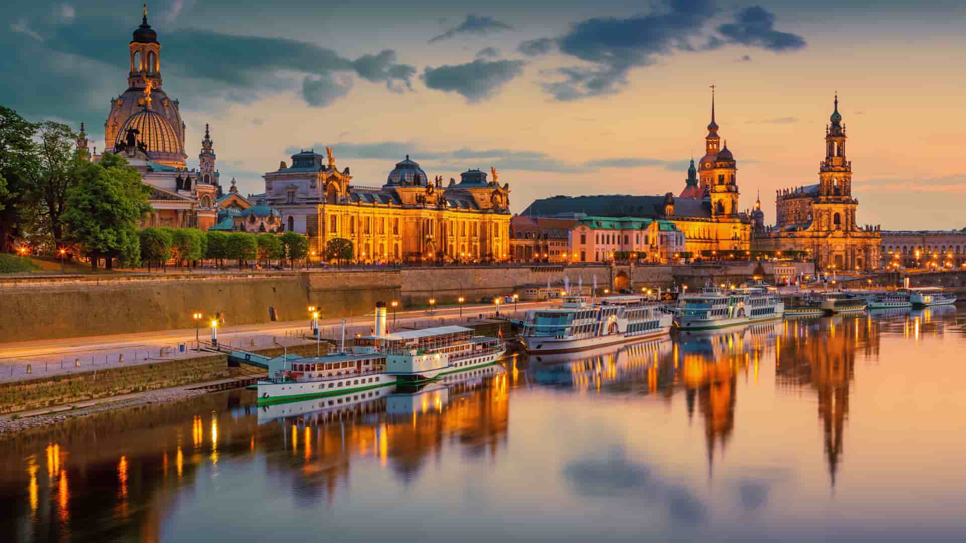 View of Dresden city skyline from Elbe river next to Augustus bridge in Germany.
