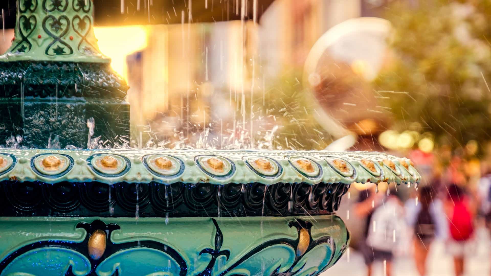 A view of the fountain and the iconic 'Rundle Mall Balls' sculpture (The Spheres) in Rundle Mall, Adelaide, South Australia. The scene captures the pedestrian shopping precinct landmark on a clear day.