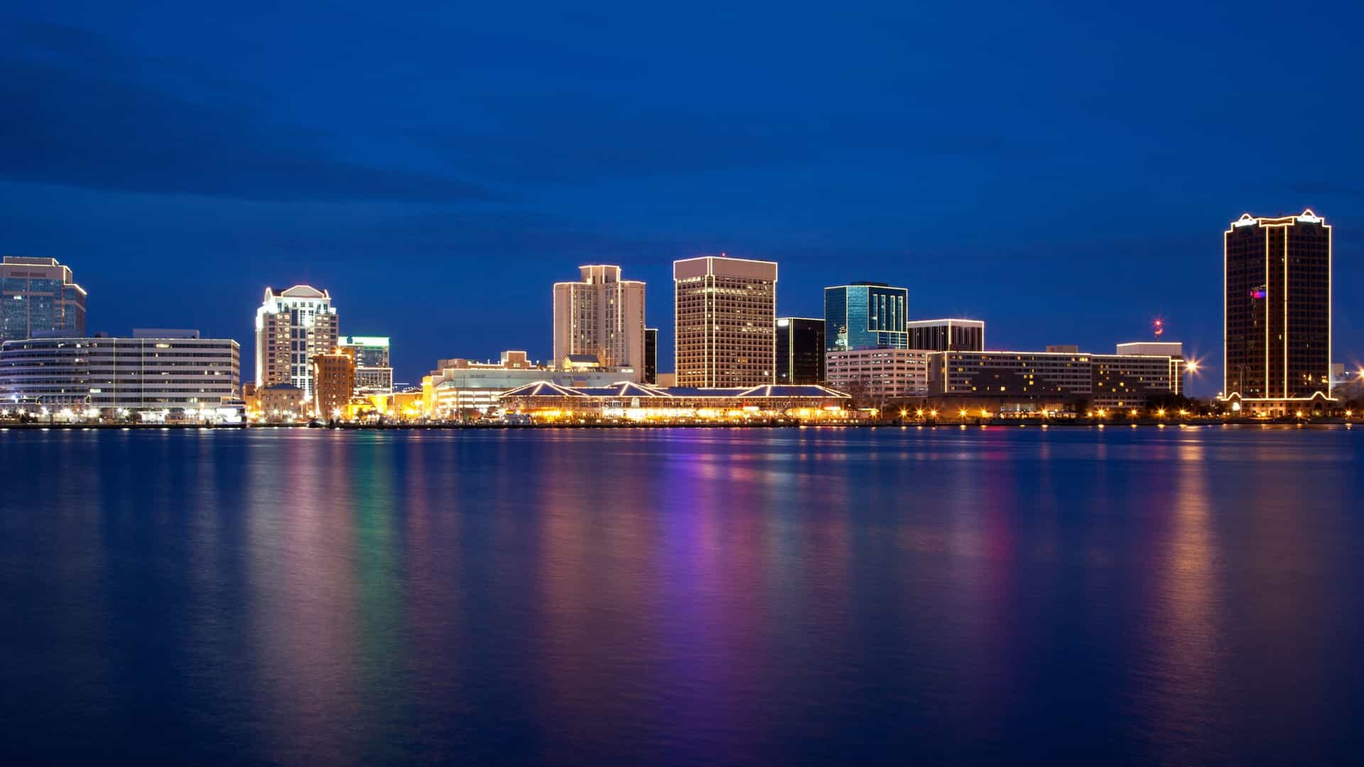 Norfolk, Virginia skyline illuminated at night.