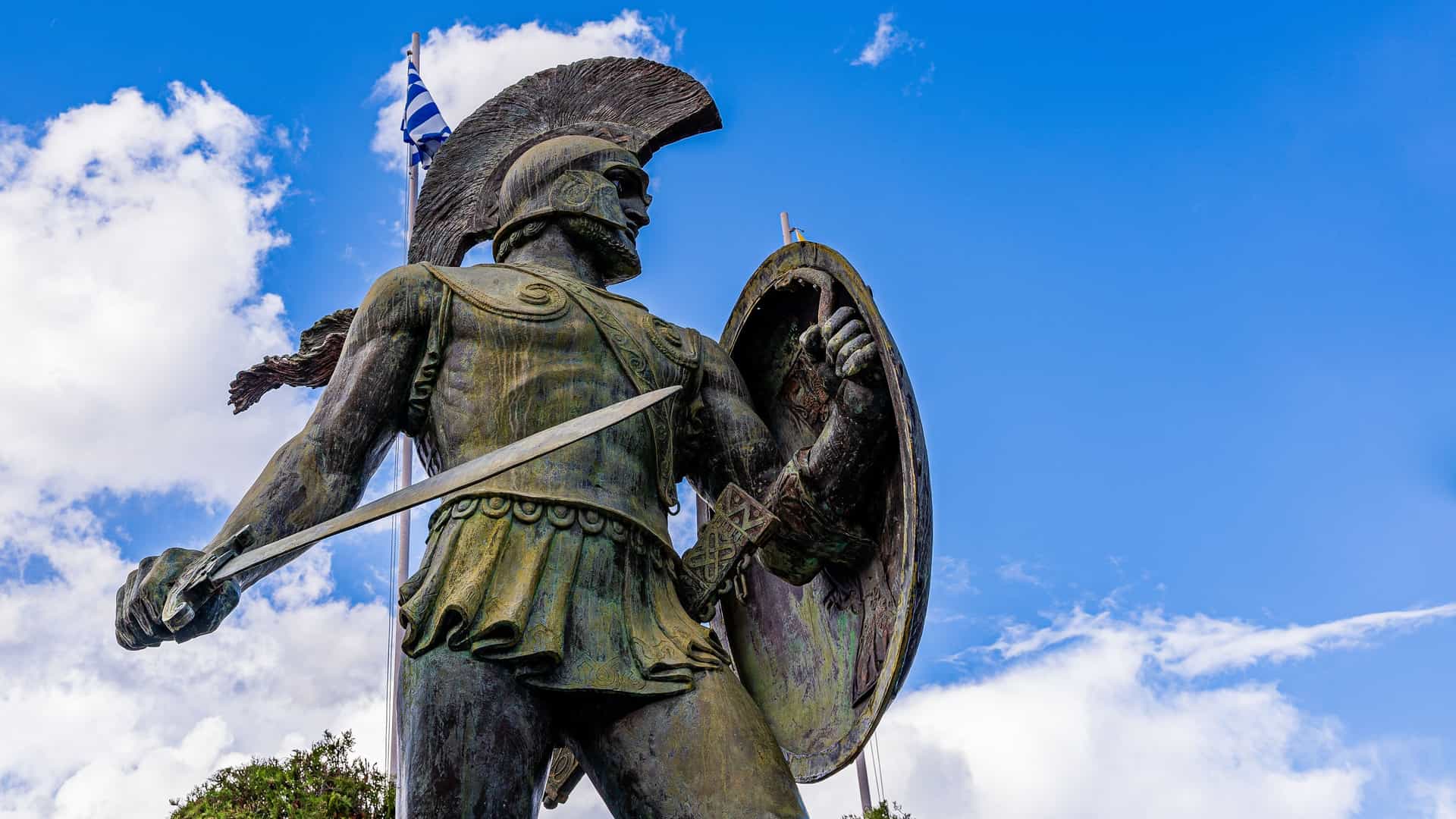 "A striking statue of the Spartan King Leonidas holding a sword and shield, a tribute to the ancient warrior, in the city of Sparta, Greece.  "