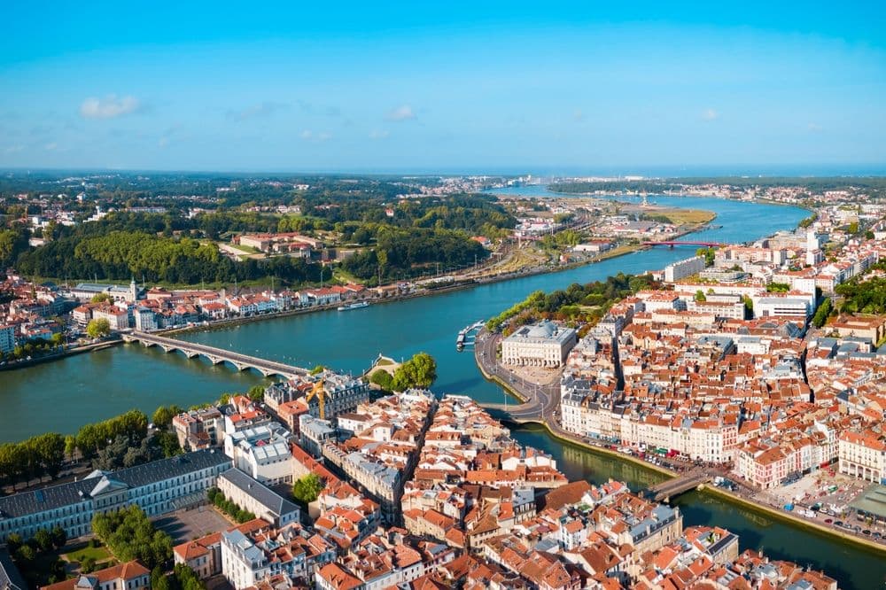 Aerial panoramic view of Bayonne city in southwestern France with historic buildings and scenic landscape.