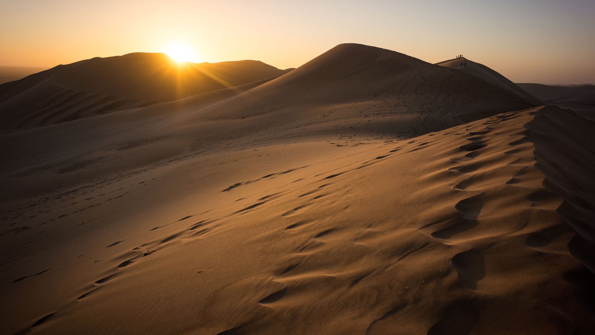 Sand dunes of Namib Desert at sunrise near Walvis Bay, Namibia.