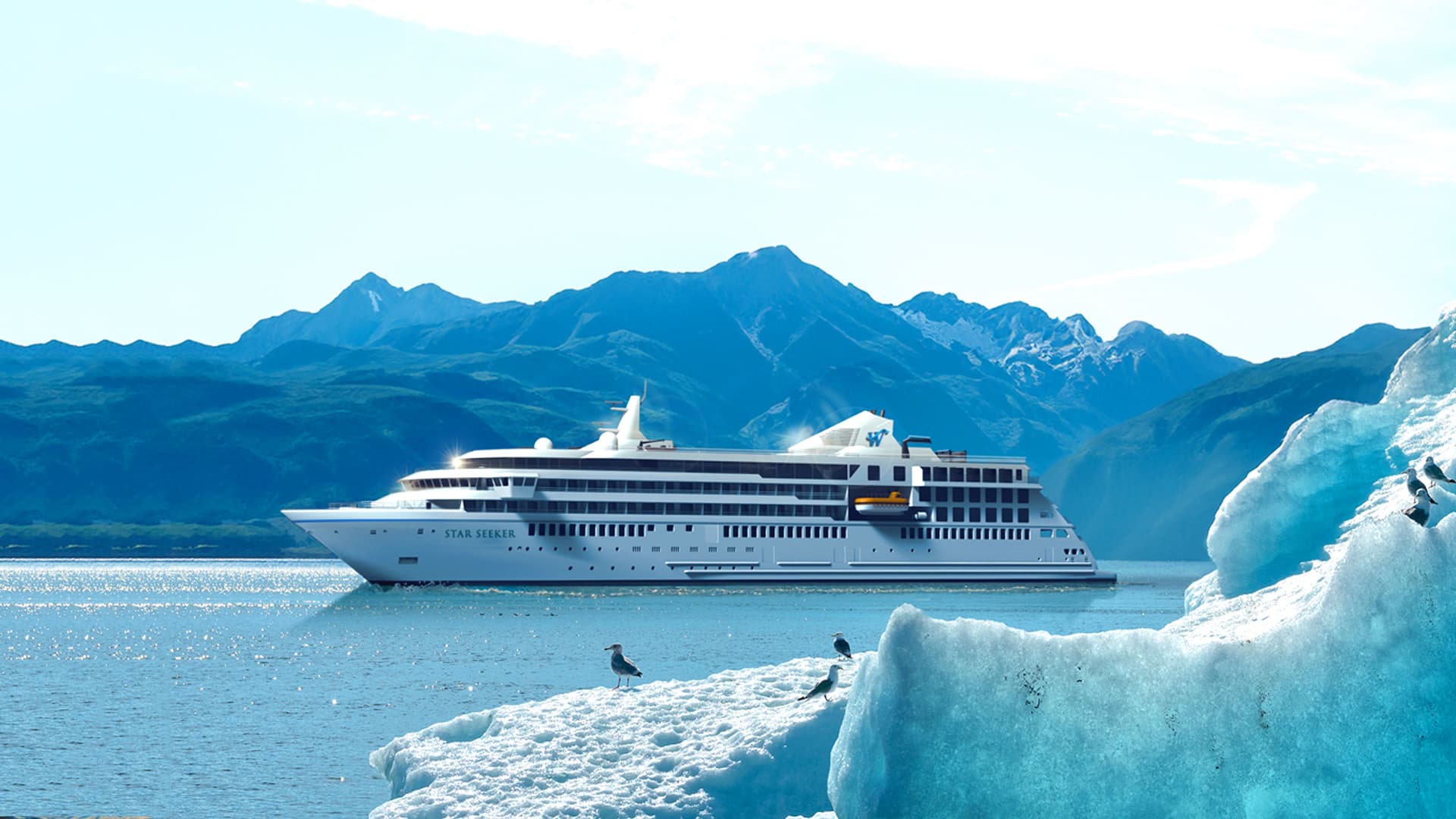 Windstar's Star Seeker cruise ship sailing by penguins.
