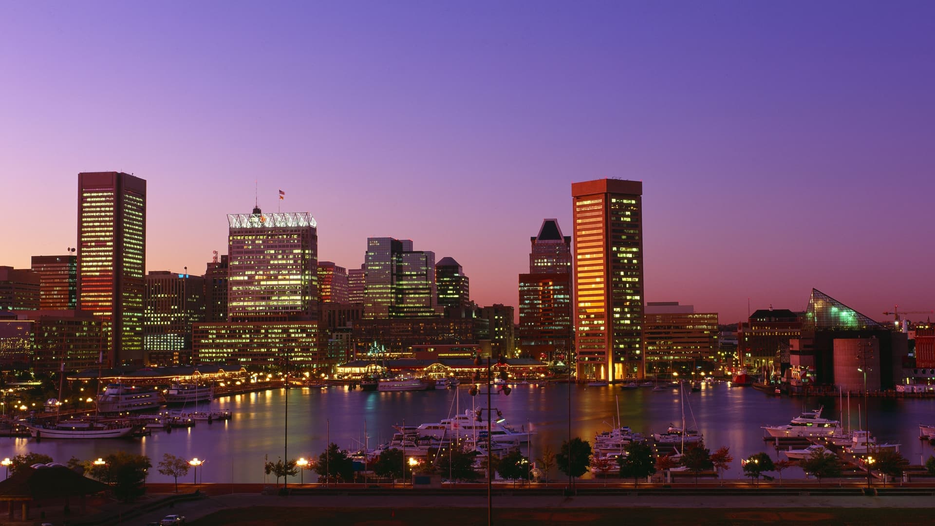 Baltimore Inner Harbor skyline at dusk.