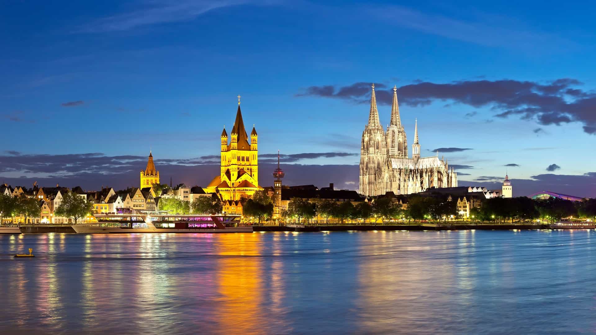 Cologne Cathedral and city at night.