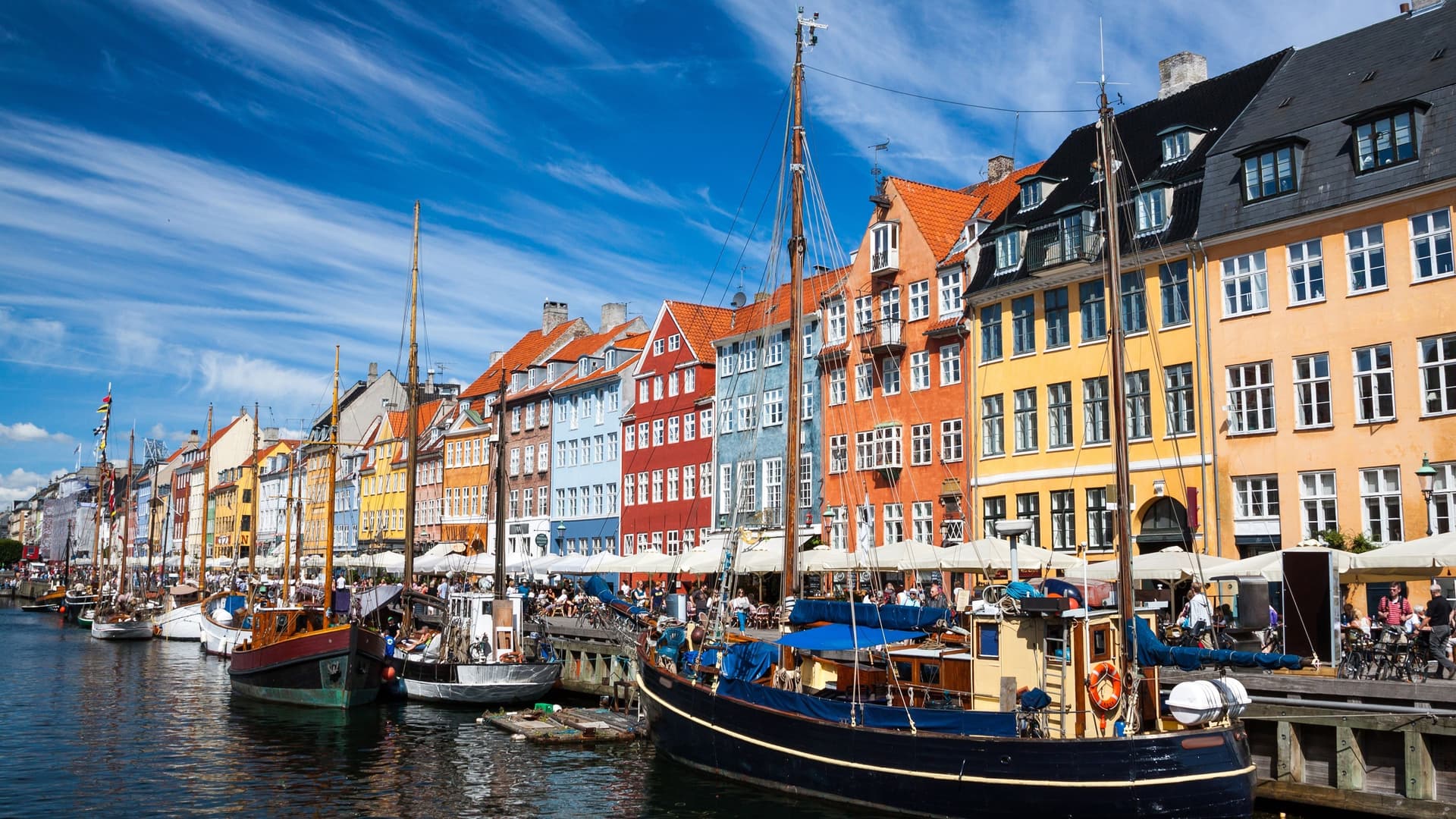 Colorful buildings and boats in Nyhavn, Copenhagen.
