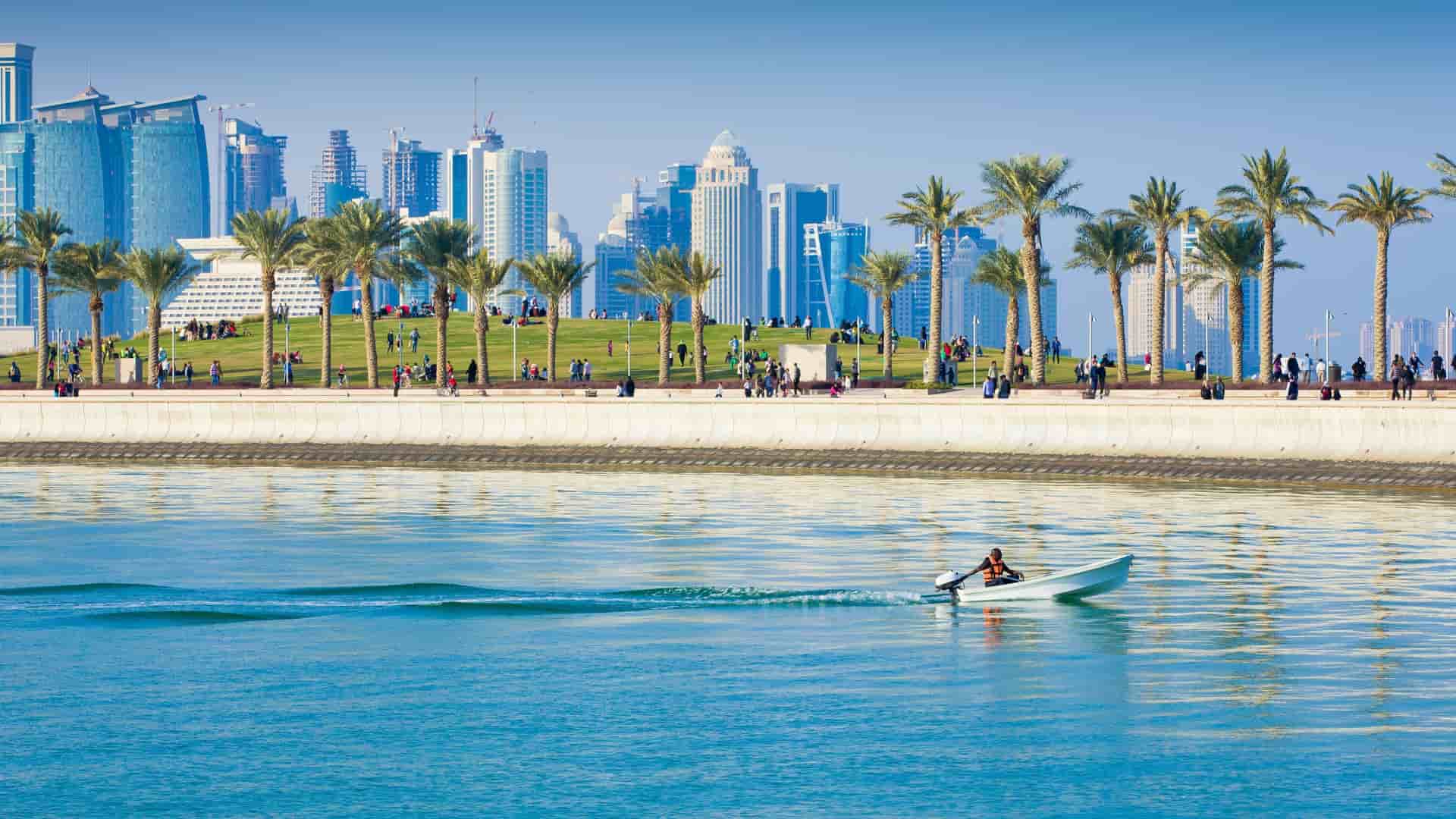Modern skyline and dhow boats in Doha, Qatar.