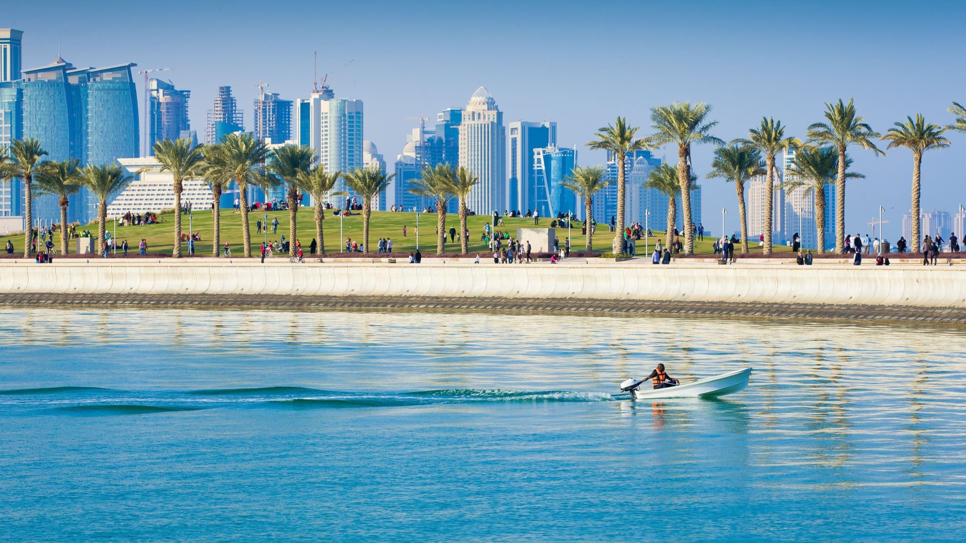 Modern skyline and dhow boats in Doha, Qatar.