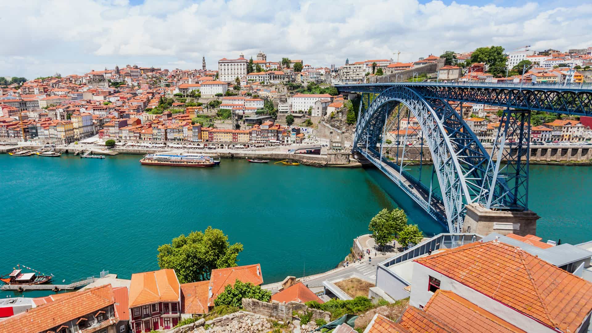 Scenic view of Porto, Portugal, showcasing its architecture and vibrant streets.