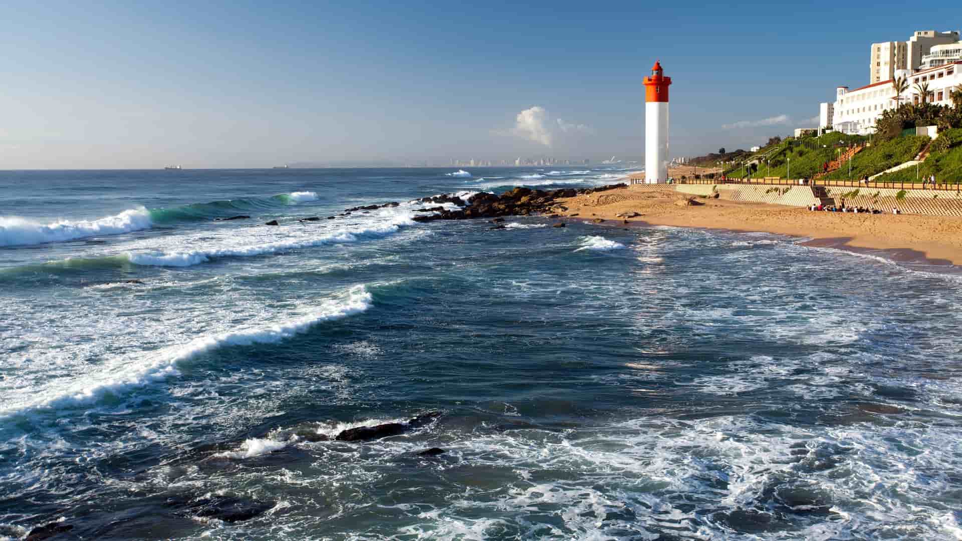 Beachfront promenade and palm trees in Durban.