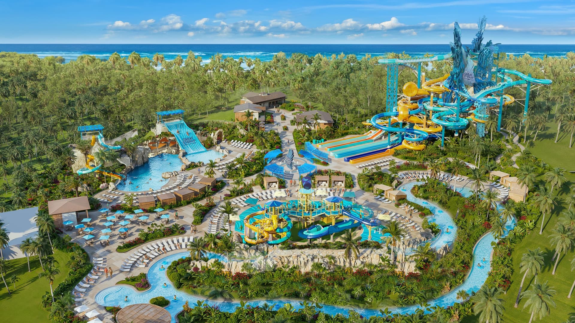Bird’s-eye view of the Great Tides Waterpark on Norwegian Cruise Line's Great Stirrup Cay, showcasing vibrant water slides, a lazy river, and splash areas surrounded by tropical palm trees and the ocean.