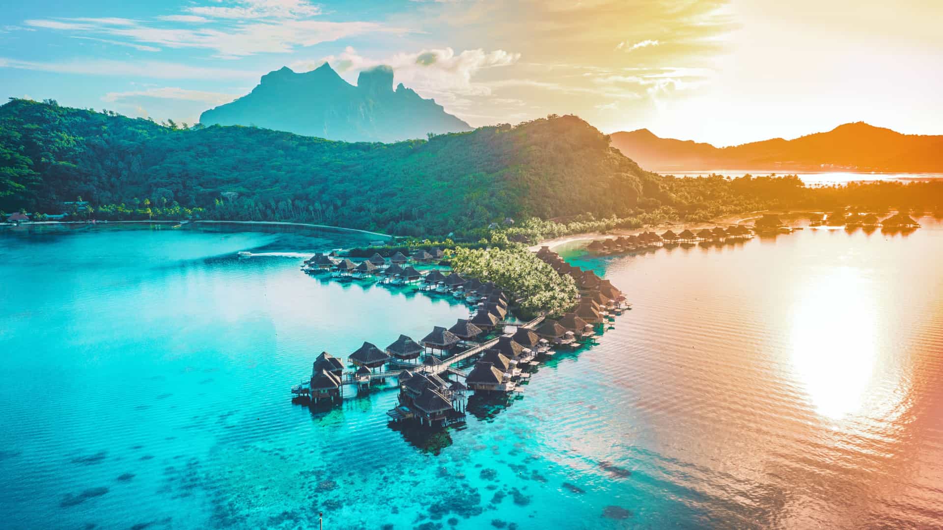 Stunning overwater bungalows in Bora Bora, French Polynesia, a dream destination in the South Pacific/Tahiti region often featured on Norwegian Cruise Line cruises.