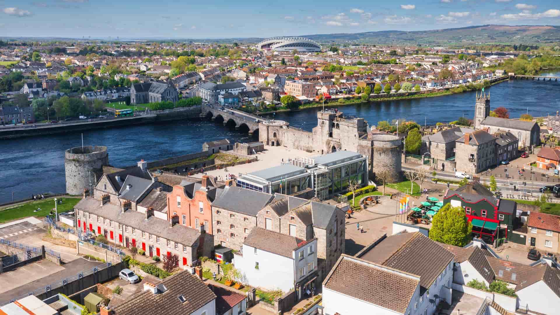 "An aerial view of the historic King John's Castle in Limerick, Ireland, a major landmark on the banks of the River Shannon. "
