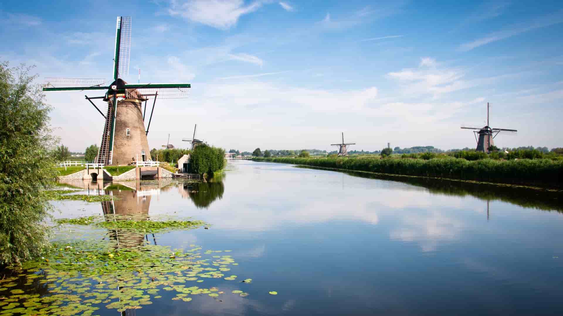 Kinderdijk windmills lining a canal in the Netherlands, Rotterdam.