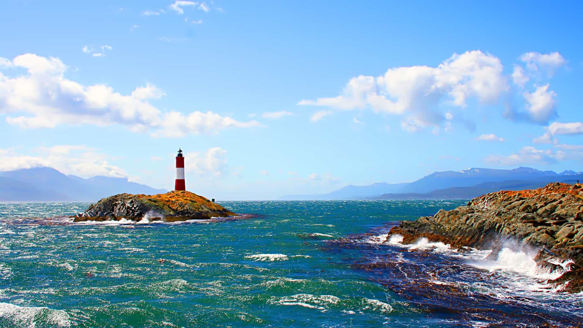 The iconic Les Eclaireurs Lighthouse near Ushuaia, Argentina, South America, often visited on Seabourn expedition cruises exploring the region and heading to Antarctica.
