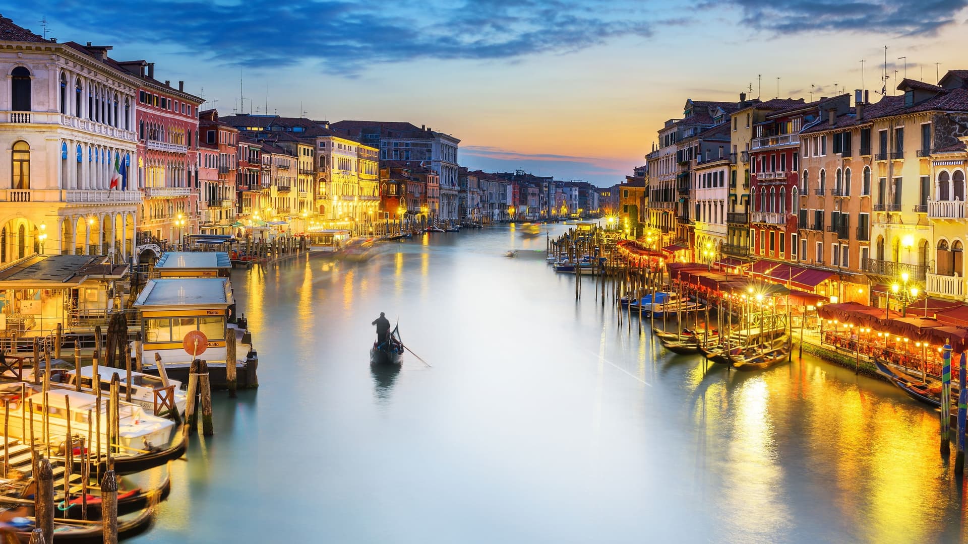 Gondolas on a canal in Venice.