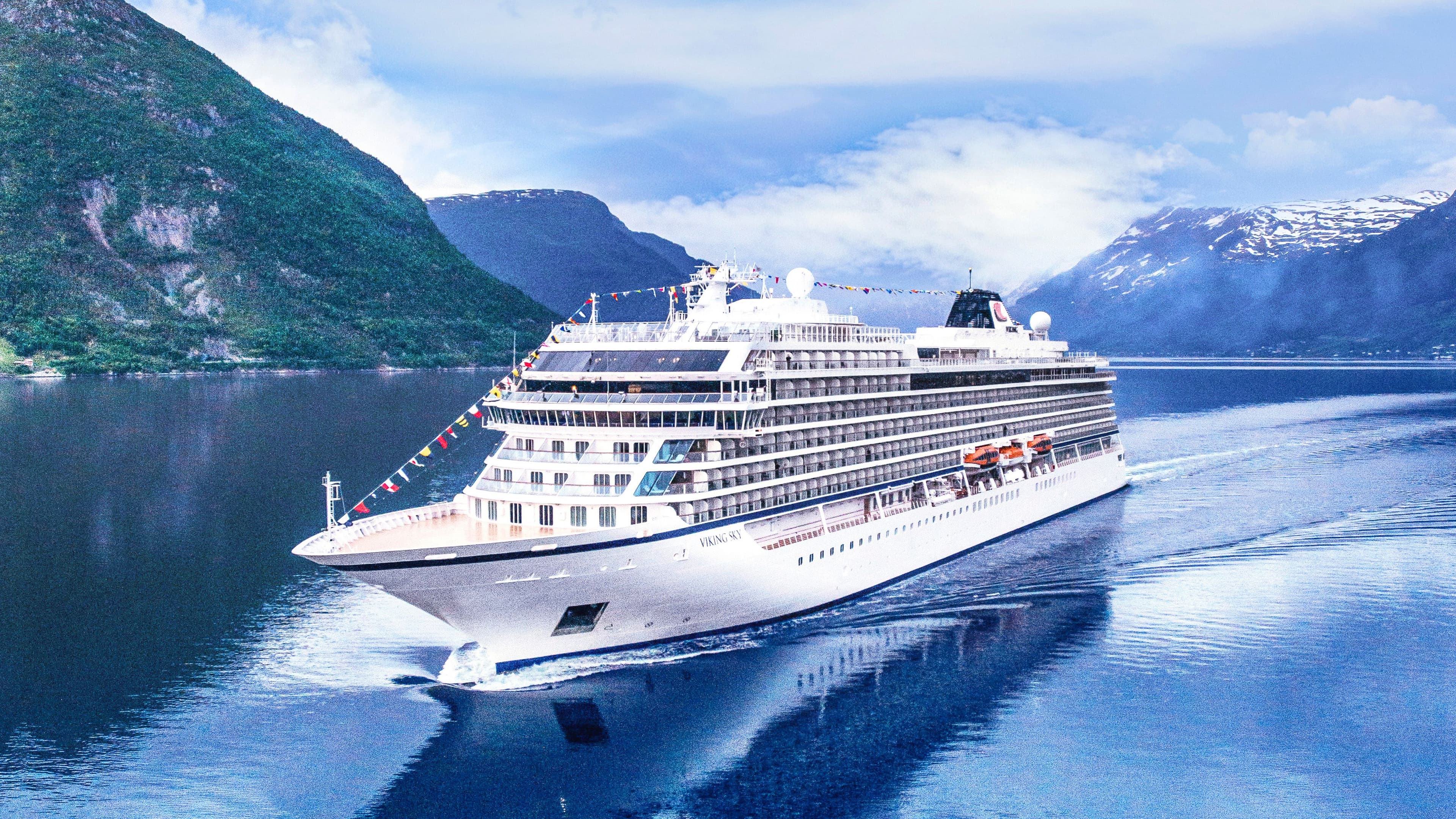 Viking Sky at sea in a fjord.