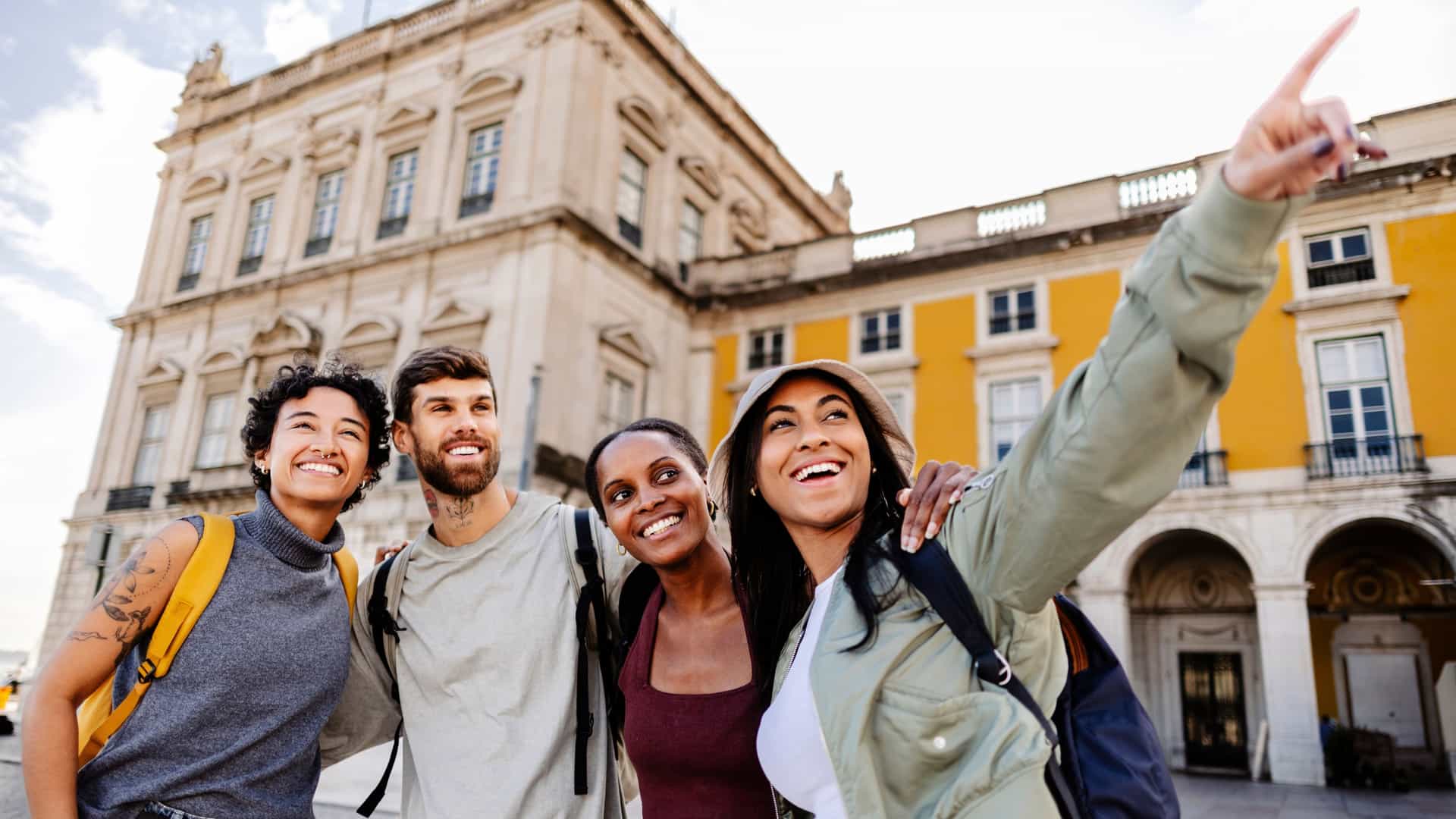 A group of people exploring Lisbon, Portual during the land-portion of a cruise tour.